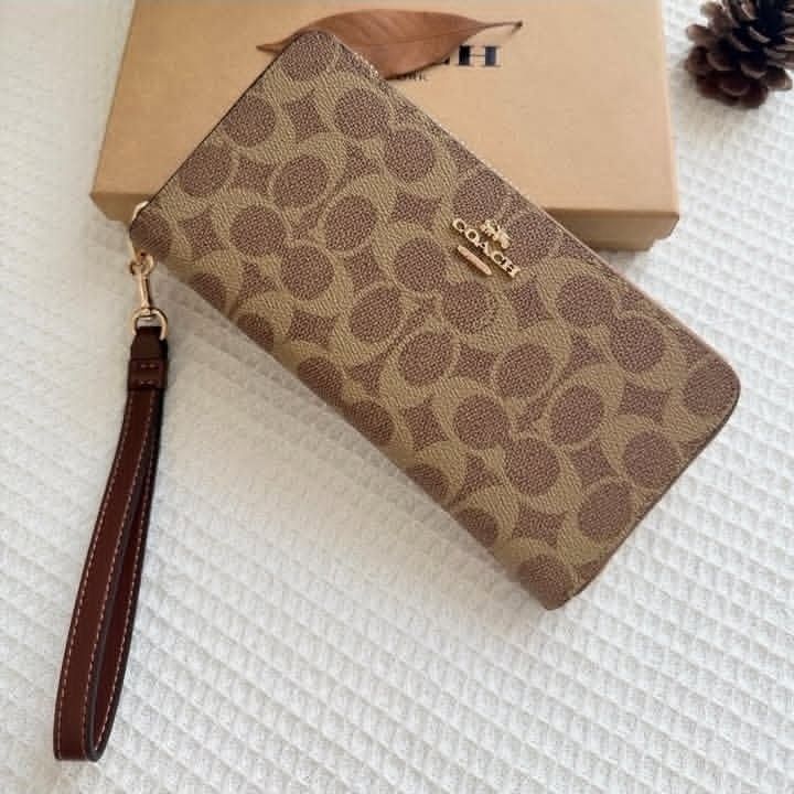 SALE - COACH LONG WALLET MONOGRAM (Category: Luxury Bags & Wallets) located in Pasig City. Submitted by titalana2011991 (Listing ID 1461222957, Image 3). Description: ORIGINAL BRANDNEW ACTUAL PHOTO FIXED PRICE NO MEET UP PAY AS U ORDER BOX/ PAPER BAG/ CARE CARD.
