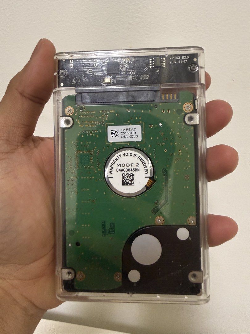 Samsung 1TB External HDD Enclosure USB 3.0 (Category: Hard Disks & Thumbdrives) located in Taguig. Submitted by allgoodsph (Listing ID 1461158827, Image 2). Description: - 1TB Samsung Momentus Hard Drive - Clear External Enclosure - USB 3.0 Connectivity (Type-C port) - Ideal for extra storage and backups - Tested and fully functional - Ready for immediate use.
