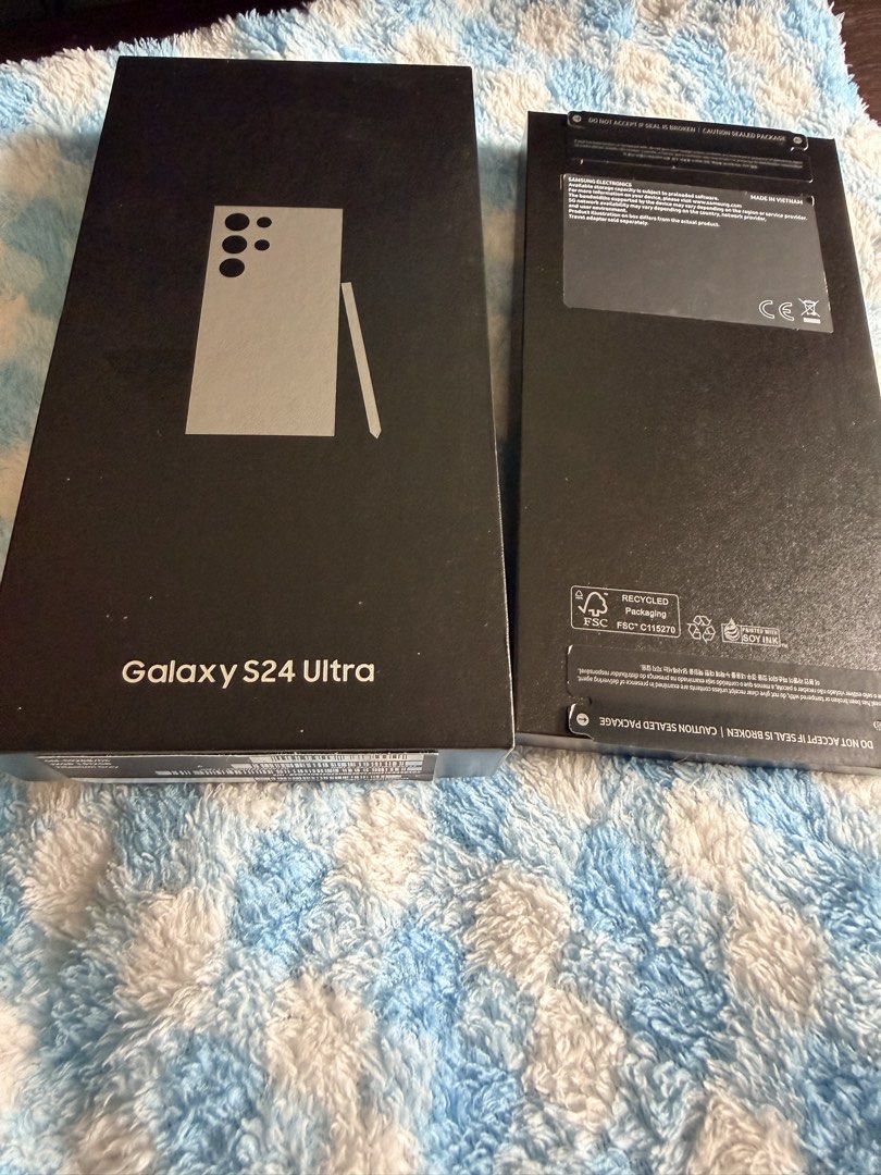 Samsung S24 Ultra 512GB (Category: Samsung) located in Quezon City. Submitted by yellowst4rr (Listing ID 1461118483, Image 3). Description: - Samsung S24 Ultra bought at SM Mall of Asia Samsung experience store - 512GB storage, 12 GB RAM, Titanium Gray - Complete set with original box and cable - Purchased Aug 2024 where it was launched - NTC unit, meaning phone is bought in Philippines. Free phone consultation at SM Moa samsung store. - Box and 