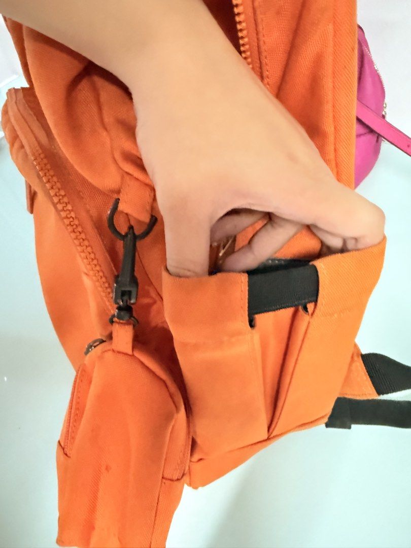 San Francisco Giants Orange MLB Backpack with Mini Pouch (Category: Backpacks) located in Pasig City. Submitted by yoursunshinelover (Listing ID 1461266131, Image 2). Description: (Authentic) MLB San Francisco Giants backpack • needs washing • replaced zipper handles • all in all once washed, can pass as new — promise • with adjustable gartered bottle compartment - Vibrant orange backpack featuring the San Francisco Giants logo. - Convenient fron