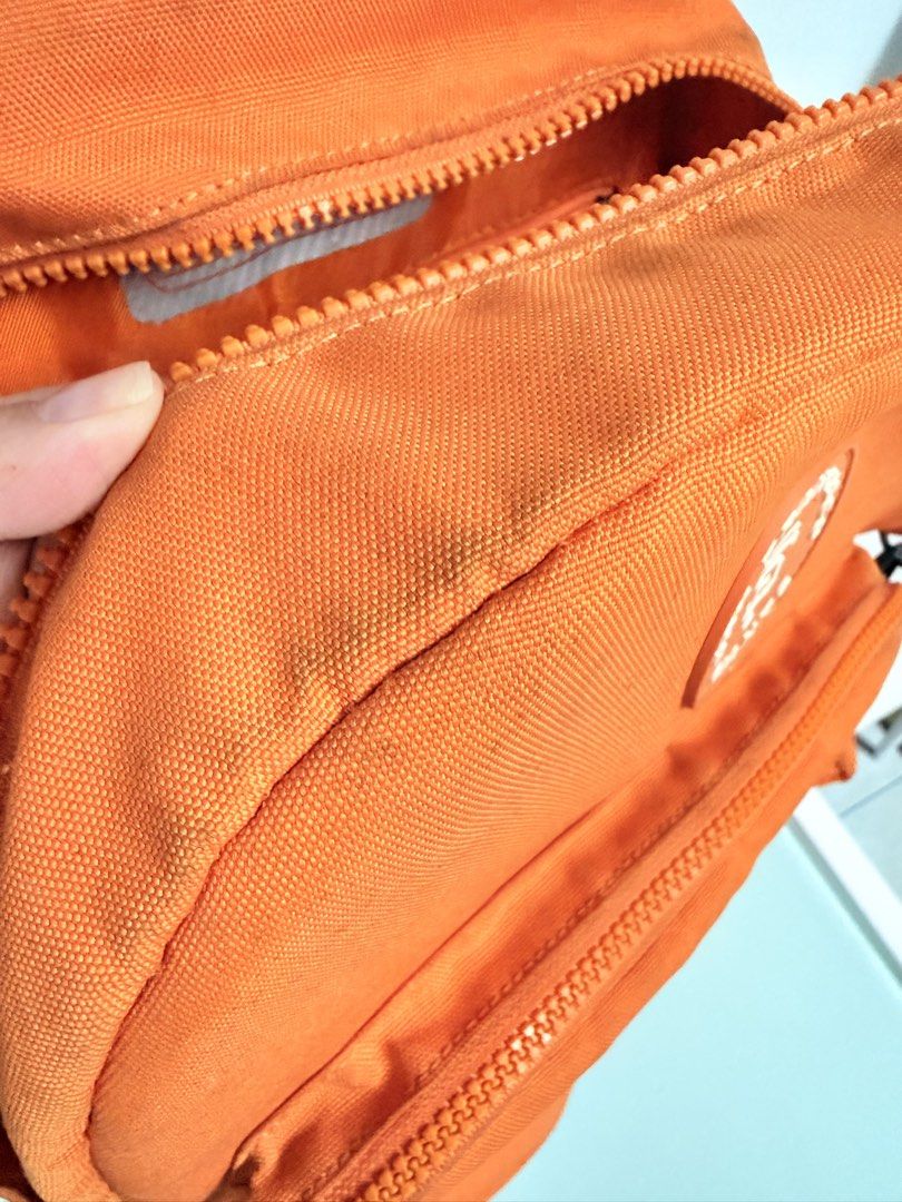 San Francisco Giants Orange MLB Backpack with Mini Pouch (Category: Backpacks) located in Pasig City. Submitted by yoursunshinelover (Listing ID 1461266131, Image 3). Description: (Authentic) MLB San Francisco Giants backpack • needs washing • replaced zipper handles • all in all once washed, can pass as new — promise • with adjustable gartered bottle compartment - Vibrant orange backpack featuring the San Francisco Giants logo. - Convenient fron