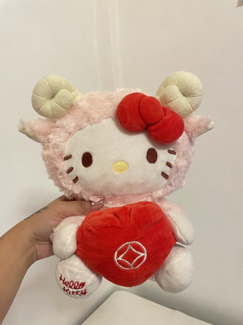 Sanrio Hello Kitty Sheep Plush with Heart (Category: Plushies & Soft Toys) located in Iba. Submitted by wealtheallymari99 (Listing ID 1461115758, Image 1). Description: .