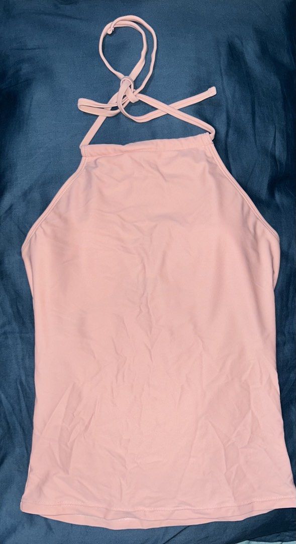 Sassa Pink Halter Neck Top Size S (Category: Sleeveless) located in Palo. Submitted by kaleidoscope_676 (Listing ID 1461123189, Image 1). Description: - Pink halter neck top from Sassa - Size S - Ties at the neck and back for adjustable fit - Simple and comfortable design - Great for layering or wearing on its own - Ideal for casual wear or beach days.