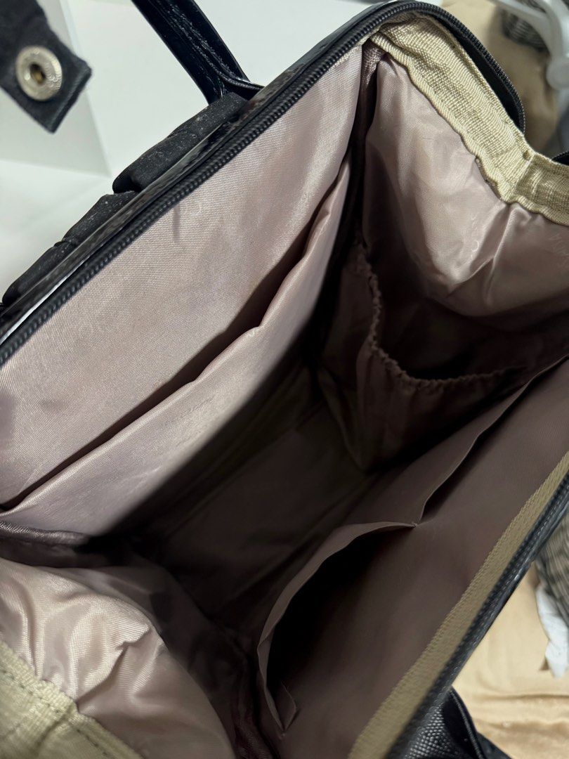 Secosana Black Backpack (Category: Backpacks) located in Cavite. Submitted by prelvds_ (Listing ID 1461275117, Image 2). Description: - Bought one year ago - No (visible) damage - Can fit up to 5 notebooks - Can fit 10.9 inch iPad - With side pockets.
