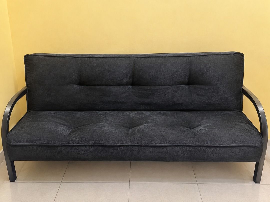 Selling Sofa Bed (Category: Sofas) located in Caloocan City. Submitted by viannskie (Listing ID 1461276103, Image 1). Description: Selling a black sofa bed in good condition. Comfortable and sturdy. Can be used as both a sofa and a bed. Buyer to shoulder delivery fee.
