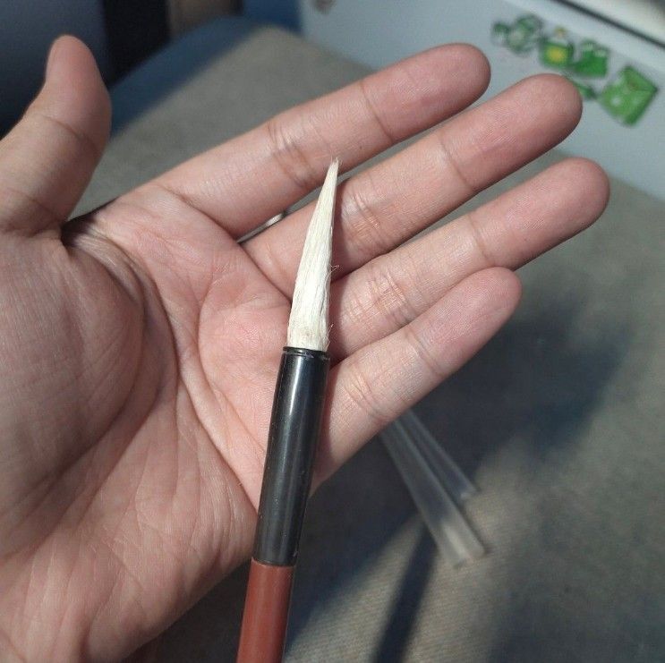 Set of 2 Chinese Calligraphy Brushes (Category: Craft Supplies & Tools) located in Quezon City. Submitted by dncpreloved (Listing ID 1461158487, Image 3). Description: - Set of 2 calligraphy brushes - Brown handles with Chinese character prints - Red loop on each brush for easy hanging - Comes with 2 clear plastic caps to protect brush tips - Ideal for practicing calligraphy strokes.