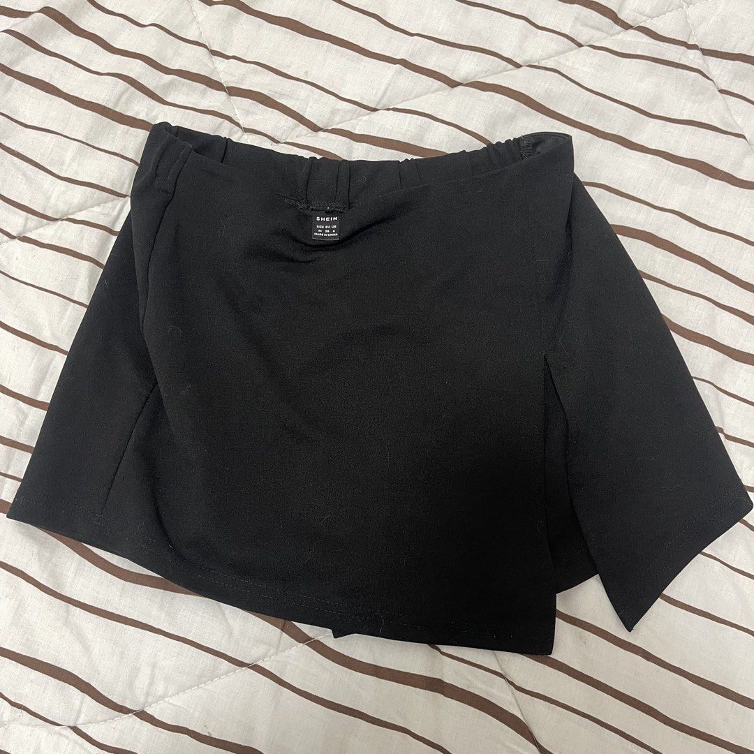 SHEIN Black Mini Skort with slit (Category: Skirts) located in Manila. Submitted by ukhy_shop (Listing ID 1461284588, Image 1). Description: - Black mini skort - Elastic waistband - Cotton/stretchy material - Great fit: S 🛒— ₱80 ONLY dm to avail ‼️.