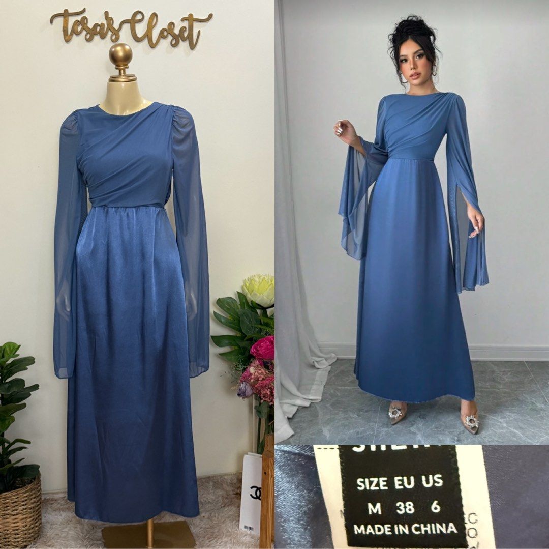 SHEIN Blue Draped Sleeve Maxi Dress (Category: Dresses) located in Santa Rosa. Submitted by martess (Listing ID 1461277238, Image 1). Description: - Elegant blue maxi dress - Size: Medium (M) - Draped sleeves with stylish slits - Comfortable elasticated waist - Ideal for special events or a night out.