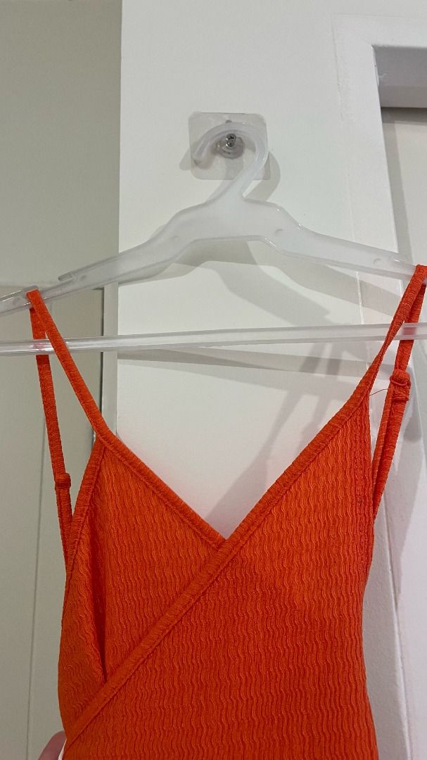 SHEIN Boho Solid Orange Wrap Hem Halter Neck Backless Dress (Category: Dresses) located in Pasig City. Submitted by precipitation_ (Listing ID 1461146473, Image 3). Description: DETAILS • Brand: SHEIN • Size: S • Color: Orange • Solid color • Halter neck • Backless • Wrap hem • Dress • Original price: ₱483 • Worn around 2x • Condition: Excellent PAYMENT GCash / BPI / BDO / MariBank 📦 Shipping via courier, shouldered by buyer. 📍 Location: Allegr