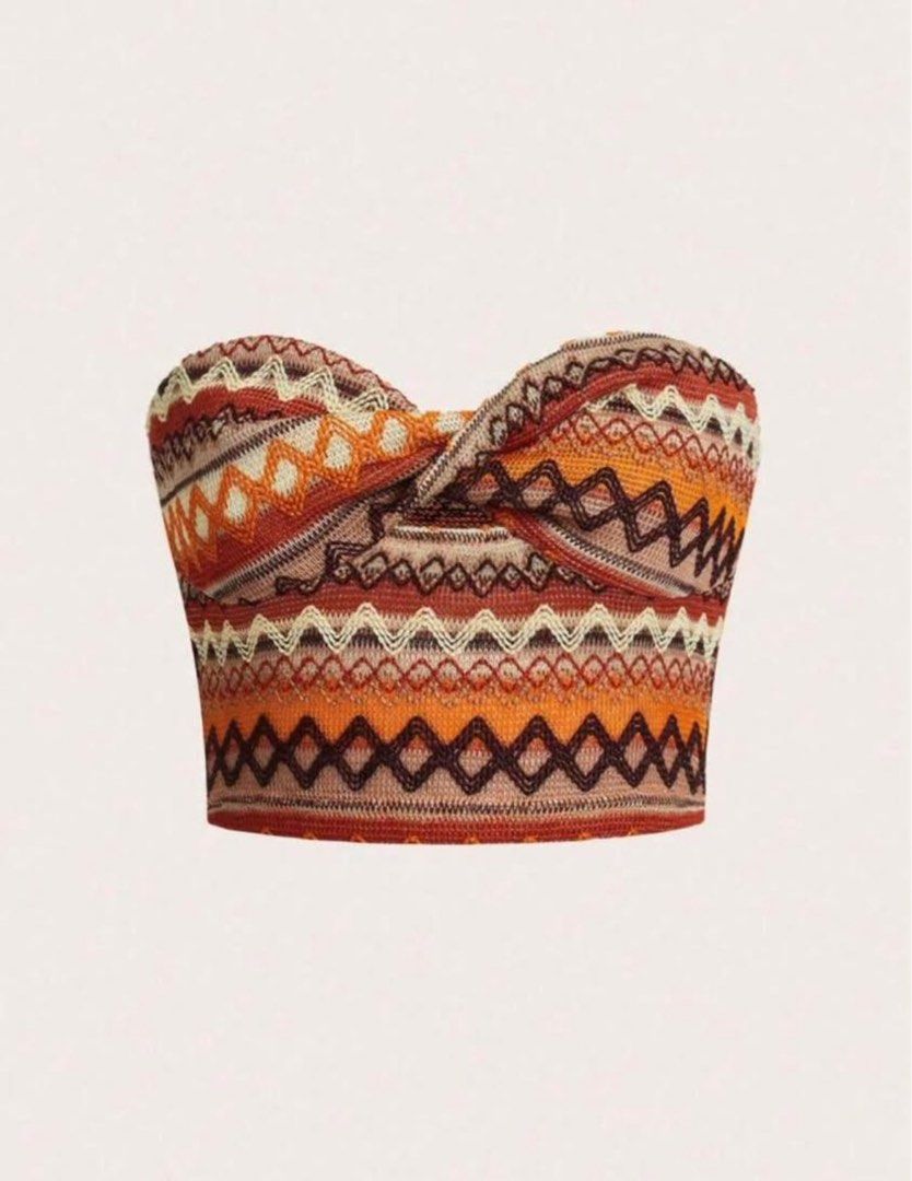 Shein Orange Tube Top (Category: Sleeveless) located in Calamba. Submitted by cdg02 (Listing ID 1461158385, Image 1). Description: - Fun zigzag print tube top - Twisted front detail - Stretchy material for comfort - Ideal for summer or beach vacations - Versatile: looks great with high-waisted shorts or skirts - Easy to wear and style Delivery fee c/o buyer.