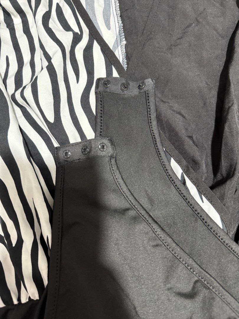 SHEIN Zebra Print Wrap Bodysuit | M (Category: Others Tops) located in Manila. Submitted by meisu_mnl (Listing ID 1461256029, Image 3). Description: SHEIN Zebra Print Wrap Bodysuit 🦓🖤 Like new ✨ Size: M (EU 38 / US 6) Bust: 36" Waist: 26–34" Color: Black & White Zebra Print • Long sleeves • Wrap-style V-neck • Zebra print contrast • Flattering fitted silhouette • Snap-button closure Statement piece na easy i-style — perfect with jeans, trousers