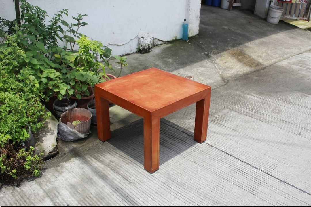 Side Table (Category: Tables & Sets) located in Meycauayan. Submitted by marygracecasimiro (Listing ID 1461228787, Image 3). Description: Minimalist Square Wooden Side Table Clean Parsons-style design and warm wood finish. Perfect as an end table, accent table or bedside table L:23 ¾ • W:23 ¾ • H:18 inches 2,700 pesos only🧡.