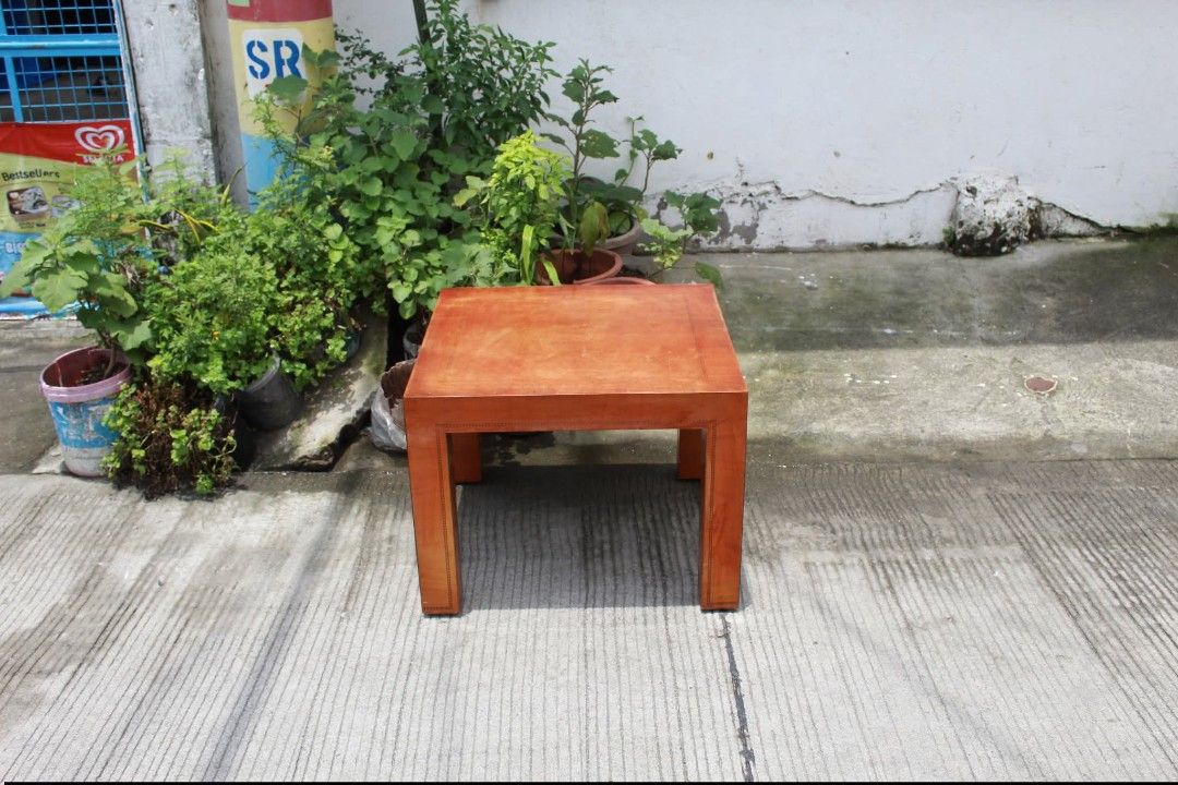 Side Table (Category: Tables & Sets) located in Meycauayan. Submitted by marygracecasimiro (Listing ID 1461228787, Image 2). Description: Minimalist Square Wooden Side Table Clean Parsons-style design and warm wood finish. Perfect as an end table, accent table or bedside table L:23 ¾ • W:23 ¾ • H:18 inches 2,700 pesos only🧡.