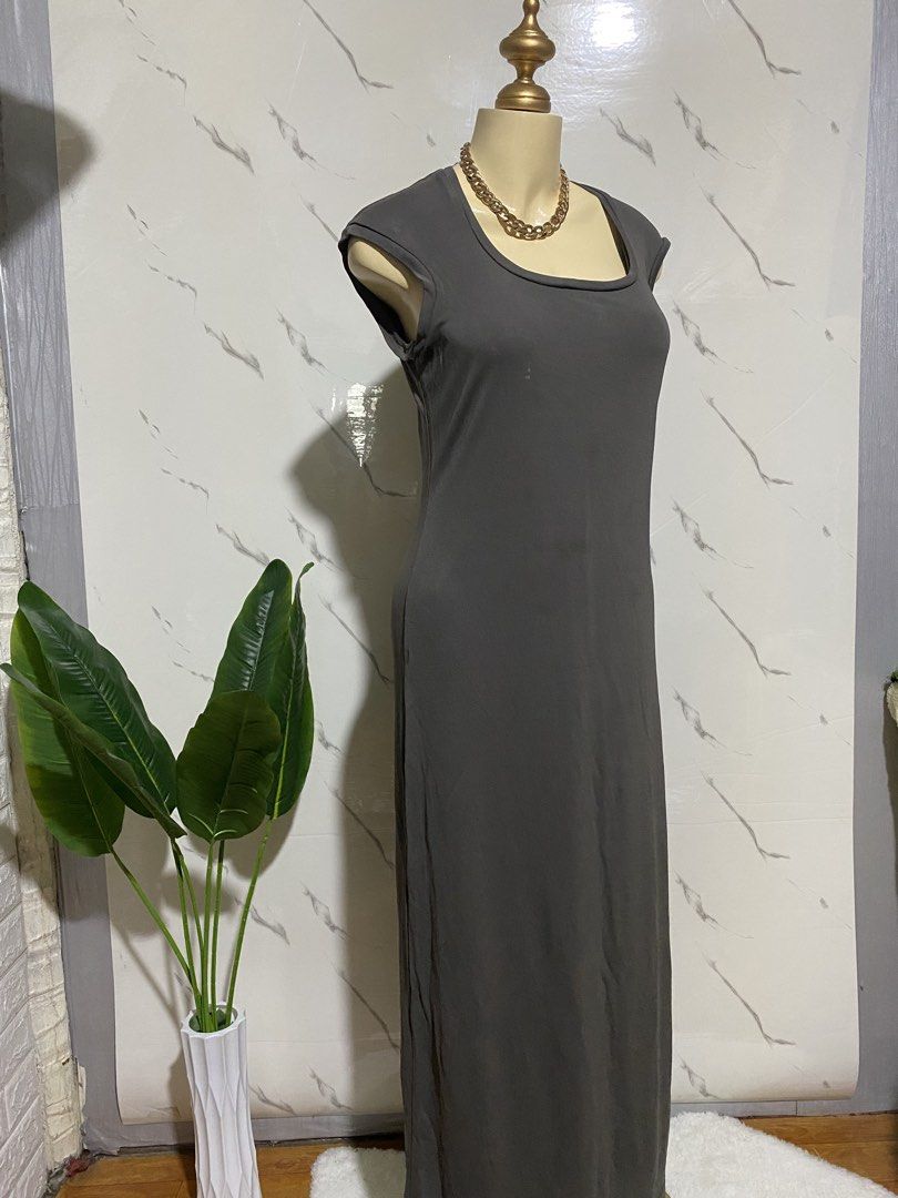 Sleek Grey Cap Sleeve Maxi Dress (Category: Dresses) located in Taguig. Submitted by dinoswear.ph (Listing ID 1461202206, Image 2). Description: - Grey maxi dress - Cap sleeves - Simple, clean silhouette - Versatile: dress up or down - Fabric with a nice drape - Perfect for any occasion - Looks great with statement jewelry.