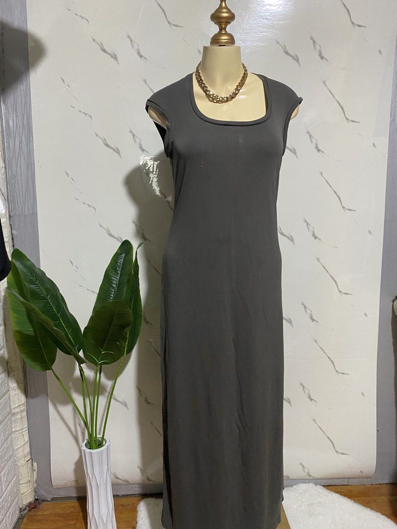 Sleek Grey Cap Sleeve Maxi Dress (Category: Dresses) located in Taguig. Submitted by dinoswear.ph (Listing ID 1461202206, Image 1). Description: - Grey maxi dress - Cap sleeves - Simple, clean silhouette - Versatile: dress up or down - Fabric with a nice drape - Perfect for any occasion - Looks great with statement jewelry.