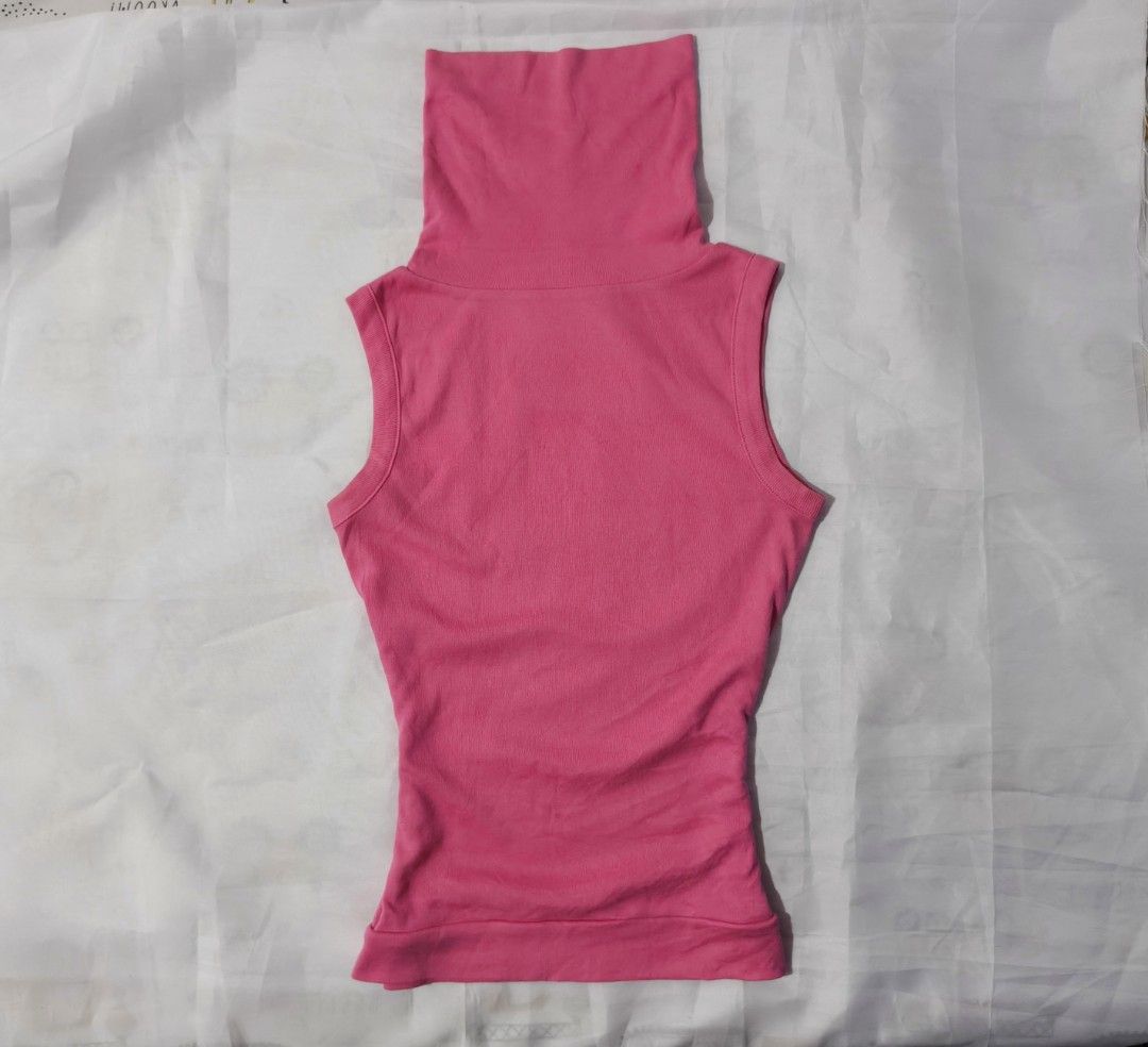 Sleeveless High-Neck Turtleneck Top (Category: Sleeveless) located in Pulilan. Submitted by hly_cllctn (Listing ID 1461197035, Image 1). Description: Sleeveless High-Neck Turtleneck Top ‎ ‎Small ‎ ‎Price: 95 (au) ‎ ‎Color: Hot Pink ‎​Style: High turtleneck, sleeveless, fitted silhouette ‎​Features: Soft stretch fabric, Korean side tag detail ‎​Condition: Good quality, no issue.