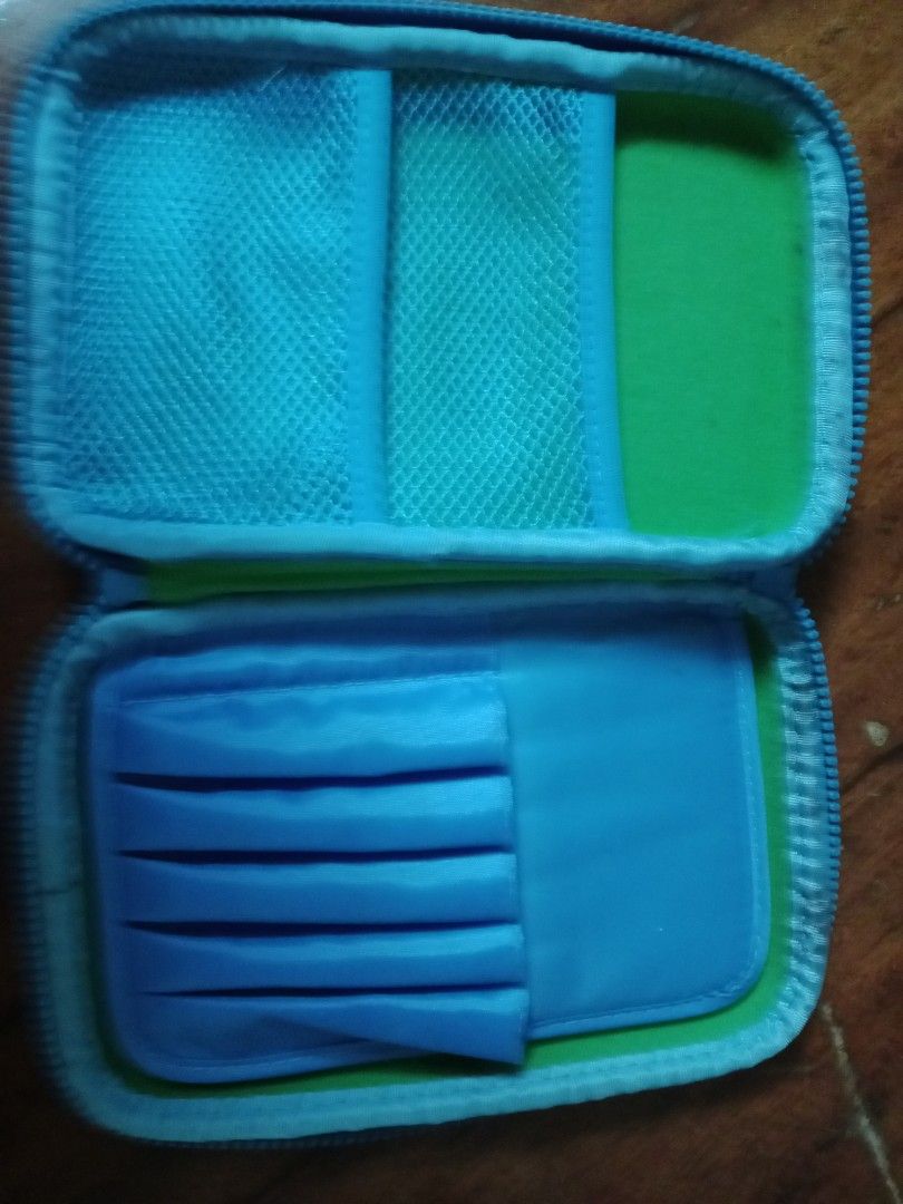 Smiggle Soccer Ball Pencil Case (Category: Stationery & School Supplies) located in Manila. Submitted by jamielleej87951 (Listing ID 1461260984, Image 2). Description: - Fun green Smiggle pencil case - Features a cool soccer ball design - Spacious interior for pens and pencils - Secure zip closure - Ideal for school or home use - A hit with kids!.