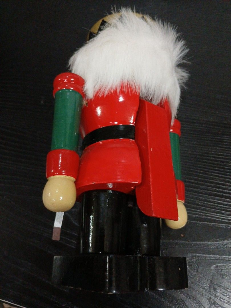 Soldier Figurine (Category: Other Home Decor) located in Davao. Submitted by ferdipt (Listing ID 1461133631, Image 2). Description: A traditional wooden nutcracker soldier figurine wearing a red and green uniform with a black crown..