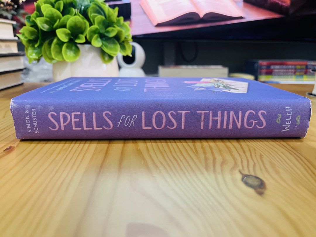 Spells for Lost Things by Jenna Evans Welch (Category: Storybooks) located in Makati City. Submitted by pagesandplay (Listing ID 1461320168, Image 2). Description: - Title: Spells for Lost Things - Author: Jenna Evans Welch (New York is Times Bestselling Author) - Genre: Fantasy, Romance - Plot Summary: Follows a girl who visits a magical town and finds a book of spells. - Appeal: A fun and engaging read, ideal for fans of fantasy and romance sto