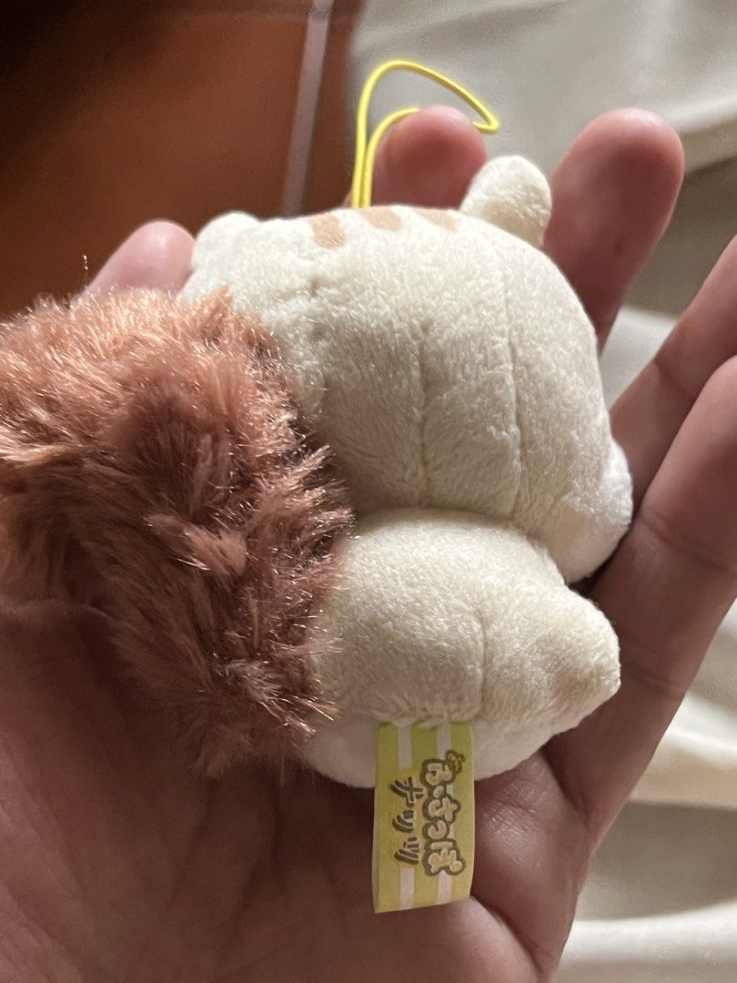 Squirrel light brown bag charm (Category: Luxury Accessories) located in Paranaque City. Submitted by bonsaiart (Listing ID 1461143443, Image 2). Description: Pre owned Good condition 275+sf Payment via GCASH or paymaya No to meetup No to cop / cod Shipping via j&t only No breaking of set or bundle.