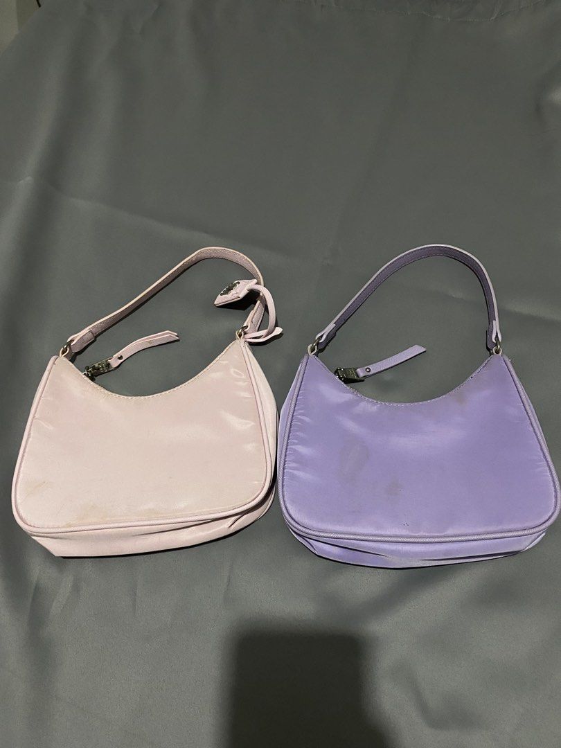 Steve Madden Shoulder Bag (Category: Shoulder Bags) located in Bacoor. Submitted by sad.burrito (Listing ID 1461290647, Image 3). Description: Steve Madden shoulder bag in pink & purple. Has storage-related stains from being stored improperly. Needs cleaning; can try a gentle stain remover/cleaning solution. Purple tag is missing, as shown. 📦 Courier: LBC / Lalamove 📍 Bacoor, Cavite.