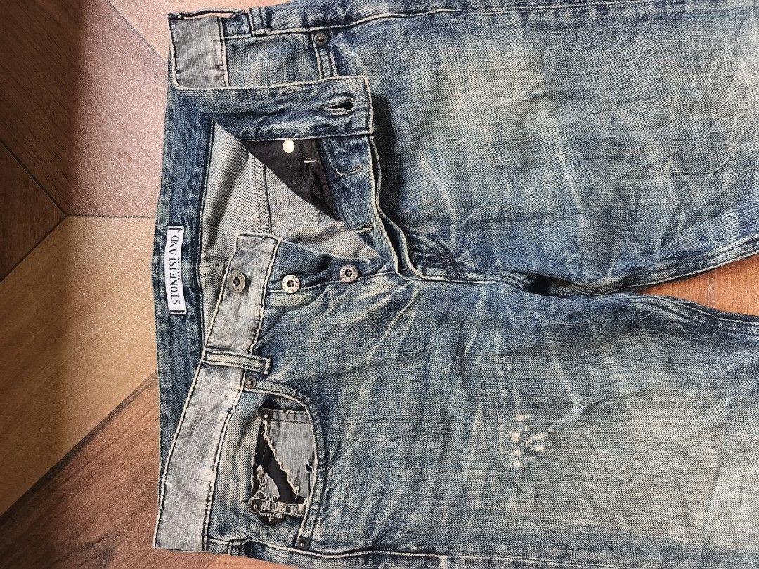 Stone Island Denim Jeans (Category: Jeans) located in Zamboanga. Submitted by d2977250664046 (Listing ID 1461243974, Image 2). Description: - Authentic Stone Island jeans - 31-32x41x7hem - Classic blue wash with distressed details - Button fly closure - Unique patched pockets on the back - Great pair of denim - Flaws Check Photos & Missing Logo Patch.
