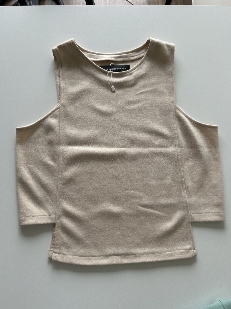 Straightforward Beige Cold Shoulder Top Size S (Category: Blouses) located in Pasig City. Submitted by gcruzz (Listing ID 1461157913, Image 1). Description: - Brand: Straightforward - Color: Beige - Design: Cold shoulder with short sleeves - Condition: Brand new, never worn - Style: Simple and versatile, great for casual wear.