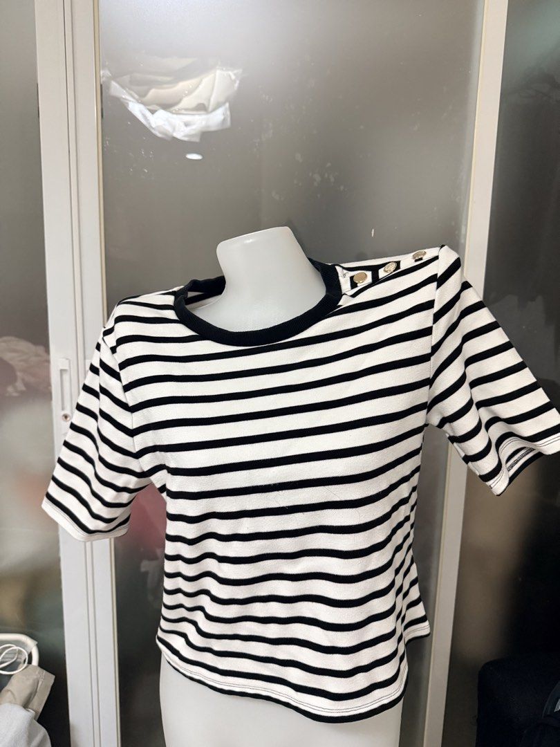 Striped Top with Button Detail (Category: Blouses) located in Manila. Submitted by vienayala295618 (Listing ID 1461235924, Image 1). Description: - Classic black and white striped top - Gold button details on the shoulder - Crew neck with black trim - Short sleeves - Great for casual wear.