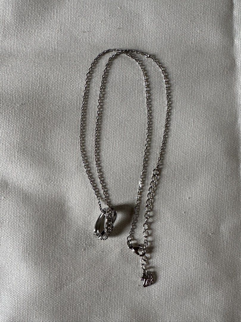 Swarovski Infinity Necklace (Category: Necklaces) located in Angeles City. Submitted by sorted.things (Listing ID 1461147807, Image 2). Description: Rhodium plated No issues at all Bought from Zalora Swarovski Site White zirconian stones.