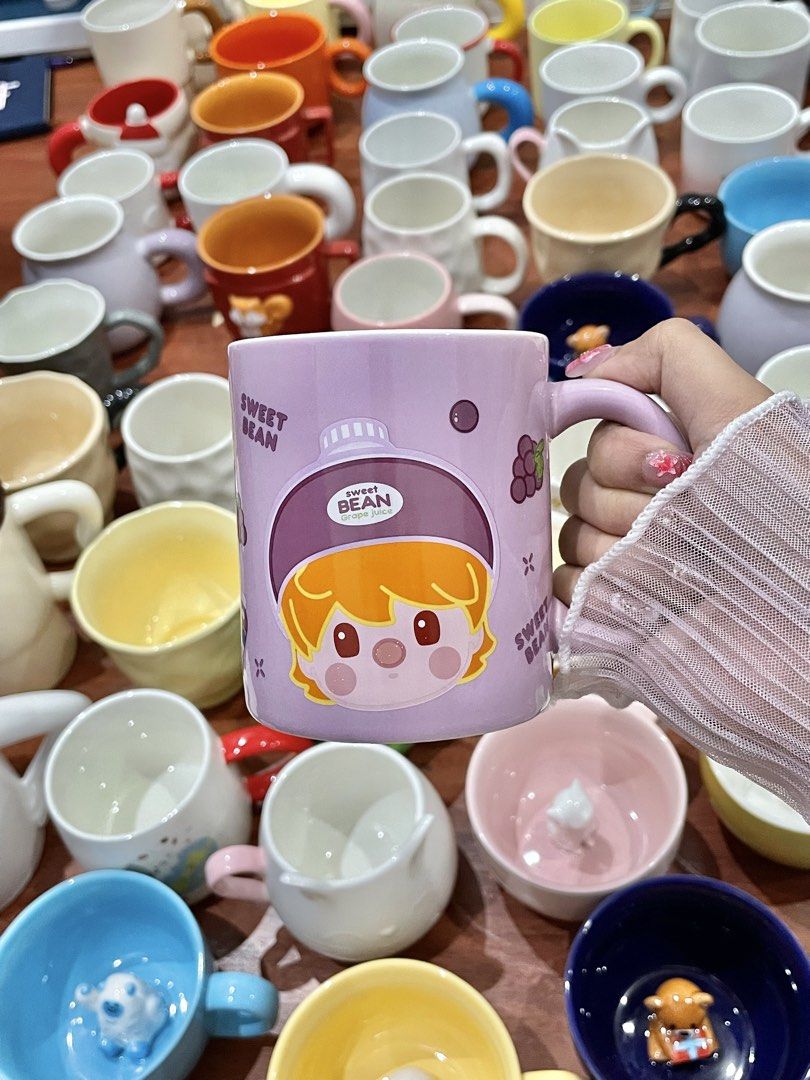 Sweet Bean Grape Juice Purple Mug (Category: Coffee & Tea Tableware) located in Quezon City. Submitted by mugs.meowph (Listing ID 1461273786, Image 2). Description: - Adorable purple mug with Sweet Bean Grape Juice character design. - Perfect for your morning coffee or tea. - Great for collectors or fans of cute stationery. - Adds a fun and colorful touch to your kitchen or desk space..