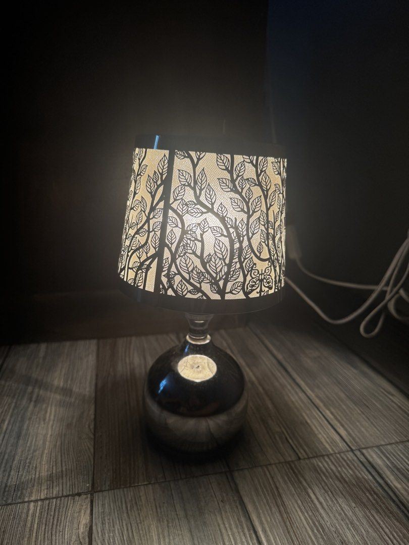 Table Lamp (touch lamp/ candle warmer) (Category: Lighting) located in Pasig City. Submitted by ponyo_ph (Listing ID 1461252396, Image 3). Description: - touch lamp w 3 light options - Features a decorative shade with a cut-out leaf pattern - Creates a beautiful, warm glow when lit - Ideal for bedside tables or as accent lighting - In good working condition.