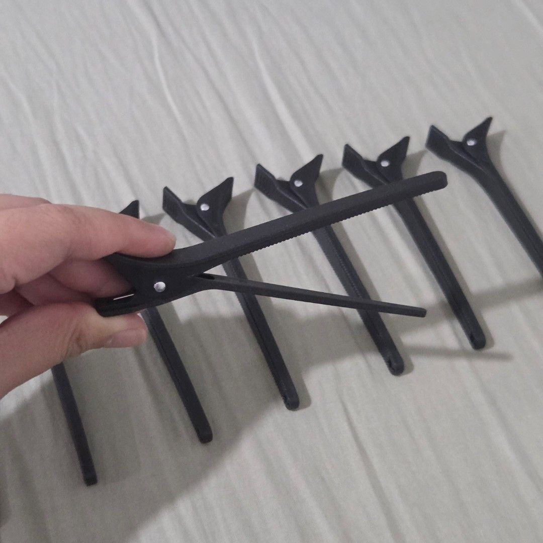 TAKE ALL 8pcs black sectioning hair clips (Category: Hair Accessories) located in Las Pinas. Submitted by simpleasangel (Listing ID 1461243994, Image 1). Description: get this for free if you buy any of my item/s ~ shipping via j&t / lalamove only mode of payment: gcash / bdo.
