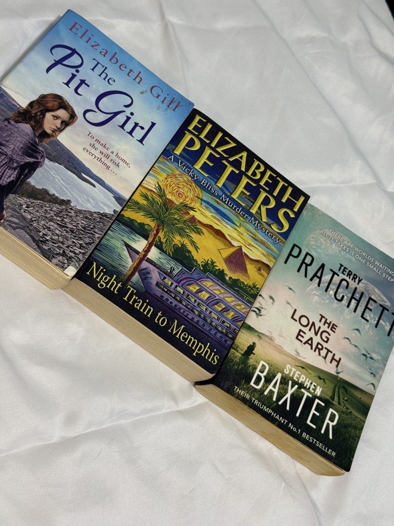TAKE ALL BOOK BUNDLE — ₱850 (Category: Storybooks) located in Caloocan City. Submitted by stevendgzmn (Listing ID 1461220642, Image 2). Description: 📚 TAKE ALL BOOK BUNDLE — ₱850 Selling these 3 pre-loved books: • The Long Earth – Terry Pratchett & Stephen Baxter — ₱350 • Night Train to Memphis – Elizabeth Peters — ₱350 • The Pit Girl – Elizabeth Gill — ₱300 💰 Sold individually: ₱350 / ₱350 / ₱300 💰 TAKE ALL: ₱850 Prices are negotiable, especi