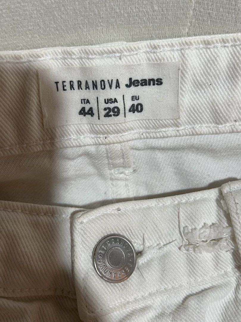 Terranova Jeans White Distressed Denim Shorts (Category: Shorts) located in Las Pinas. Submitted by reiclutter (Listing ID 1461293375, Image 3). Description: - Brand: Terranova Jeans - Color: White Denim - Style: Distressed with rips and frayed hem - Features: Classic five-pocket style, button and zip closure - Condition: Barely used. Too big on me..
