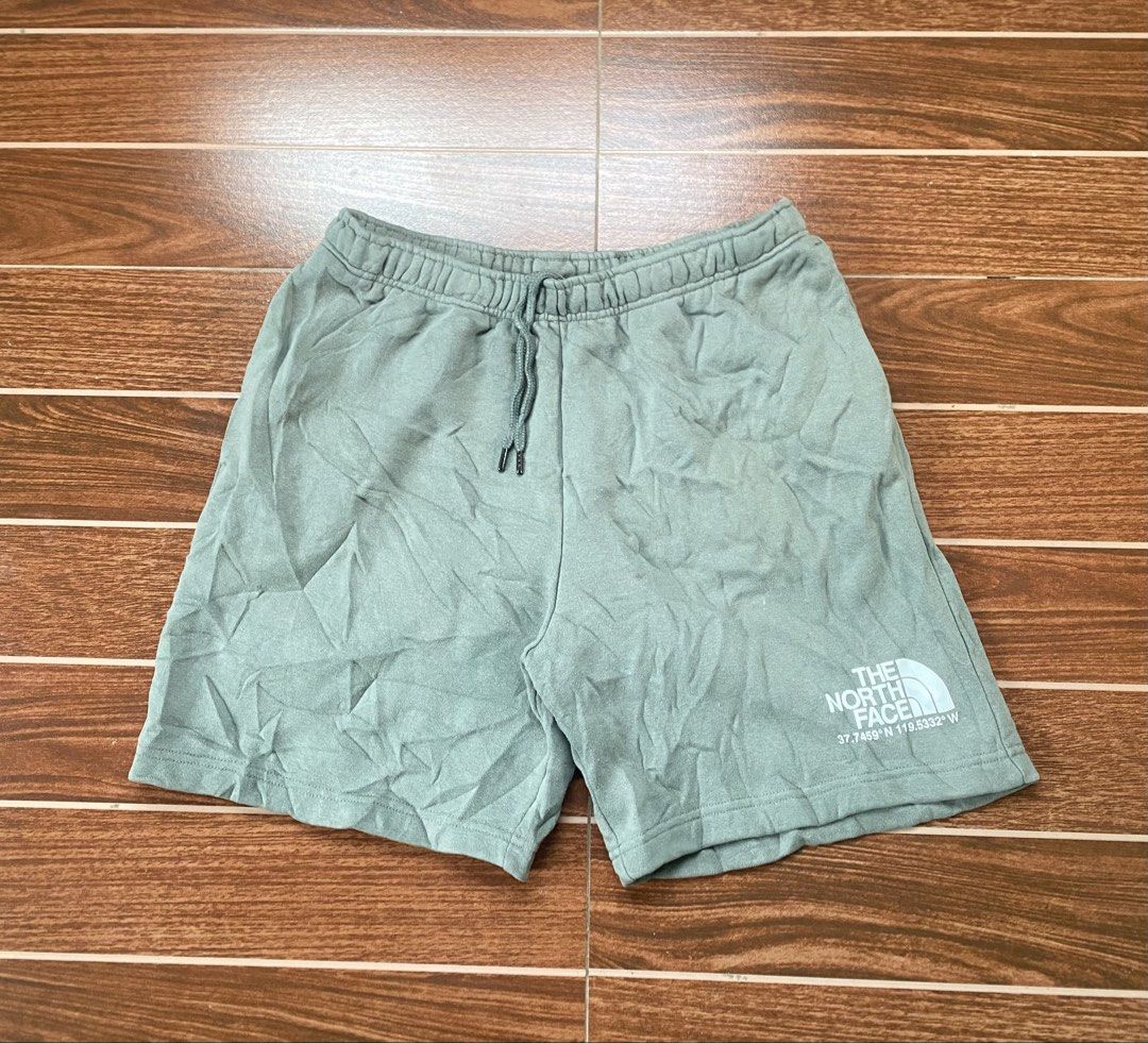 The North Face Logo Shorts (Category: Shorts) located in Cebu City. Submitted by thriftpherskzai (Listing ID 1461259836, Image 1). Description: - Brand: The North Face - Color: Light Green - Features: Brand logo and coordinates on the side - Waistband: Elastic with drawstring - Material: Cotton and polyester blend - Best for: Casual wear, lounging TNF COTTON SHORT SIZE L 31-34W x 17.5L EXCELLENT SEE DETAILS.