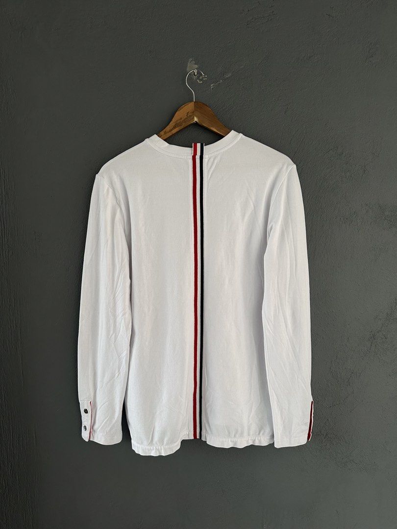 Thom Browne - Back Stripe Long Sleeve Shirt (Category: Tshirts & Polo Shirts ) located in Pasig City. Submitted by worn2wice (Listing ID 1461300565, Image 2). Description: Size 3 Measurements (in) Width 19.5 Length 26/28 Sleeve Length 24.5 Excellent condition No copyright infringement intended. This post is for resale purposes only. All trademarks, logos, and brand names belong to their respective owners..