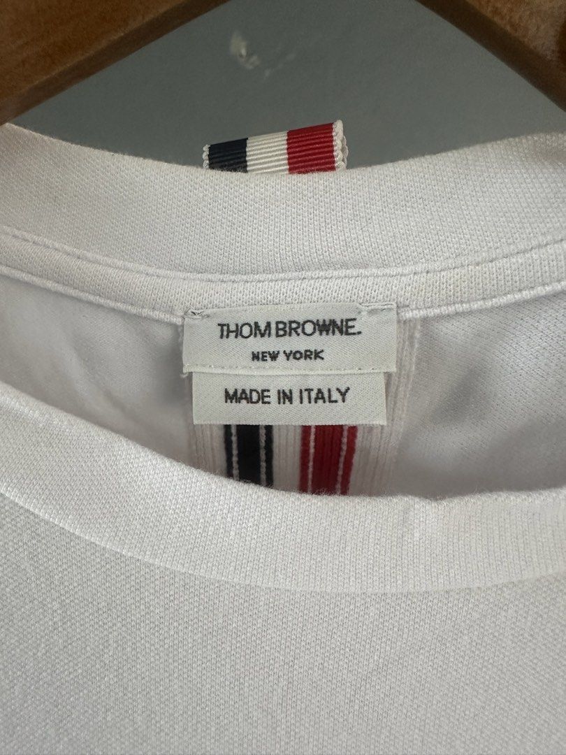 Thom Browne - Back Stripe Long Sleeve Shirt (Category: Tshirts & Polo Shirts ) located in Pasig City. Submitted by worn2wice (Listing ID 1461300565, Image 3). Description: Size 3 Measurements (in) Width 19.5 Length 26/28 Sleeve Length 24.5 Excellent condition No copyright infringement intended. This post is for resale purposes only. All trademarks, logos, and brand names belong to their respective owners..
