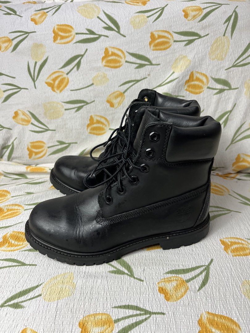 Timberland Black Leather Lace-Up Boots (Category: Boots) located in Manila. Submitted by homegrwn_thrift (Listing ID 1461167558, Image 2). Description: - Classic black Timberland boots - Genuine leather upper - Lace-up closure for a secure fit - Durable sole - Ideal for everyday wear - Women's Size 7.