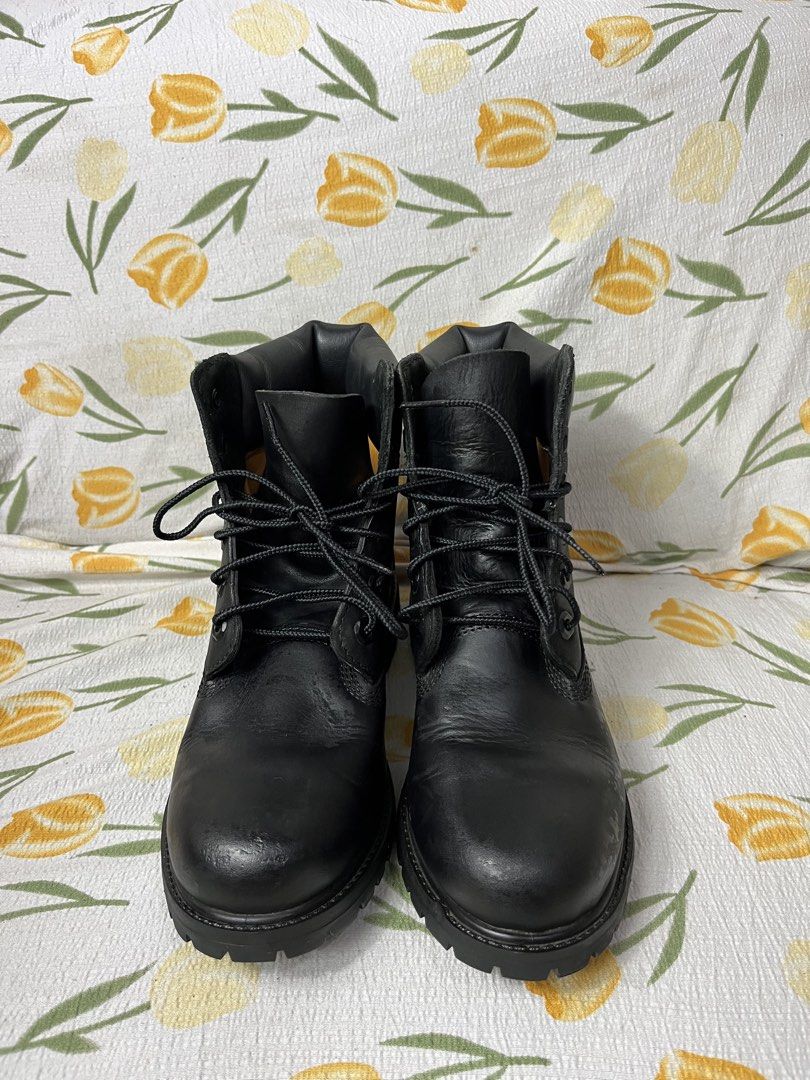Timberland Black Leather Lace-Up Boots (Category: Boots) located in Manila. Submitted by homegrwn_thrift (Listing ID 1461167558, Image 1). Description: - Classic black Timberland boots - Genuine leather upper - Lace-up closure for a secure fit - Durable sole - Ideal for everyday wear - Women's Size 7.