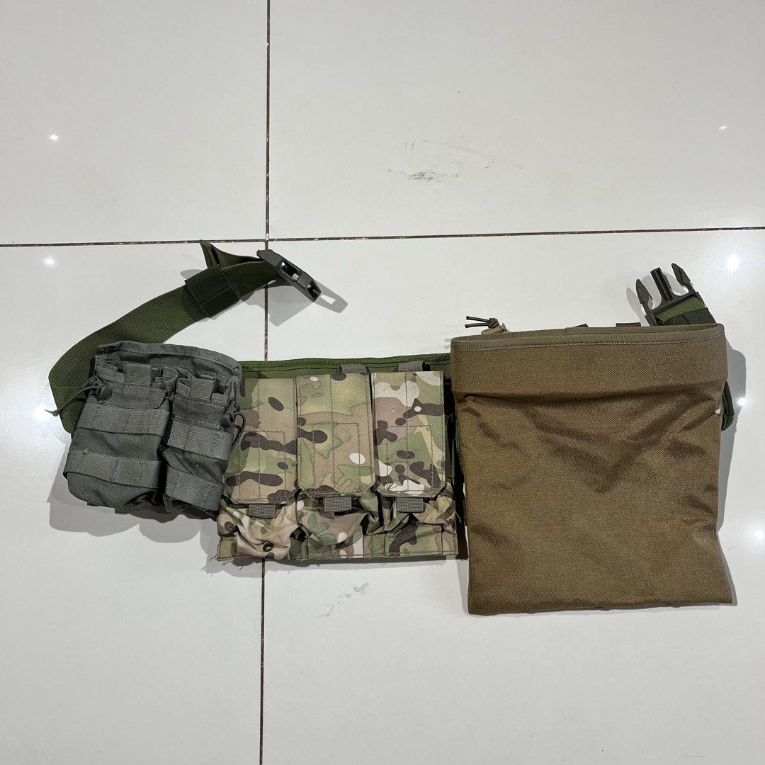TMC Tactical Vest Pouch Set Multicam Dump Pouch (Category: Other Sports Equipment and Supplies) located in Valencia. Submitted by yaku_lux (Listing ID 1461125055, Image 1). Description: TMC Tactical Vest Pouch Set - Includes dump pouch and magazine pouches. Features Multicam, OD green, and grey colors. MOLLE compatible. Perfect for airsoft and tactical use. Excellent condition.