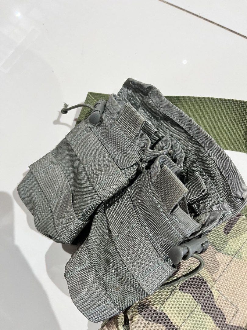 TMC Tactical Vest Pouch Set Multicam Dump Pouch (Category: Other Sports Equipment and Supplies) located in Valencia. Submitted by yaku_lux (Listing ID 1461125055, Image 3). Description: TMC Tactical Vest Pouch Set - Includes dump pouch and magazine pouches. Features Multicam, OD green, and grey colors. MOLLE compatible. Perfect for airsoft and tactical use. Excellent condition.