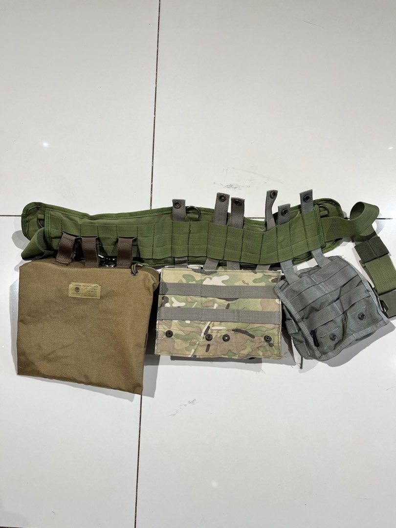 TMC Tactical Vest Pouch Set Multicam Dump Pouch (Category: Other Sports Equipment and Supplies) located in Valencia. Submitted by yaku_lux (Listing ID 1461125055, Image 2). Description: TMC Tactical Vest Pouch Set - Includes dump pouch and magazine pouches. Features Multicam, OD green, and grey colors. MOLLE compatible. Perfect for airsoft and tactical use. Excellent condition.
