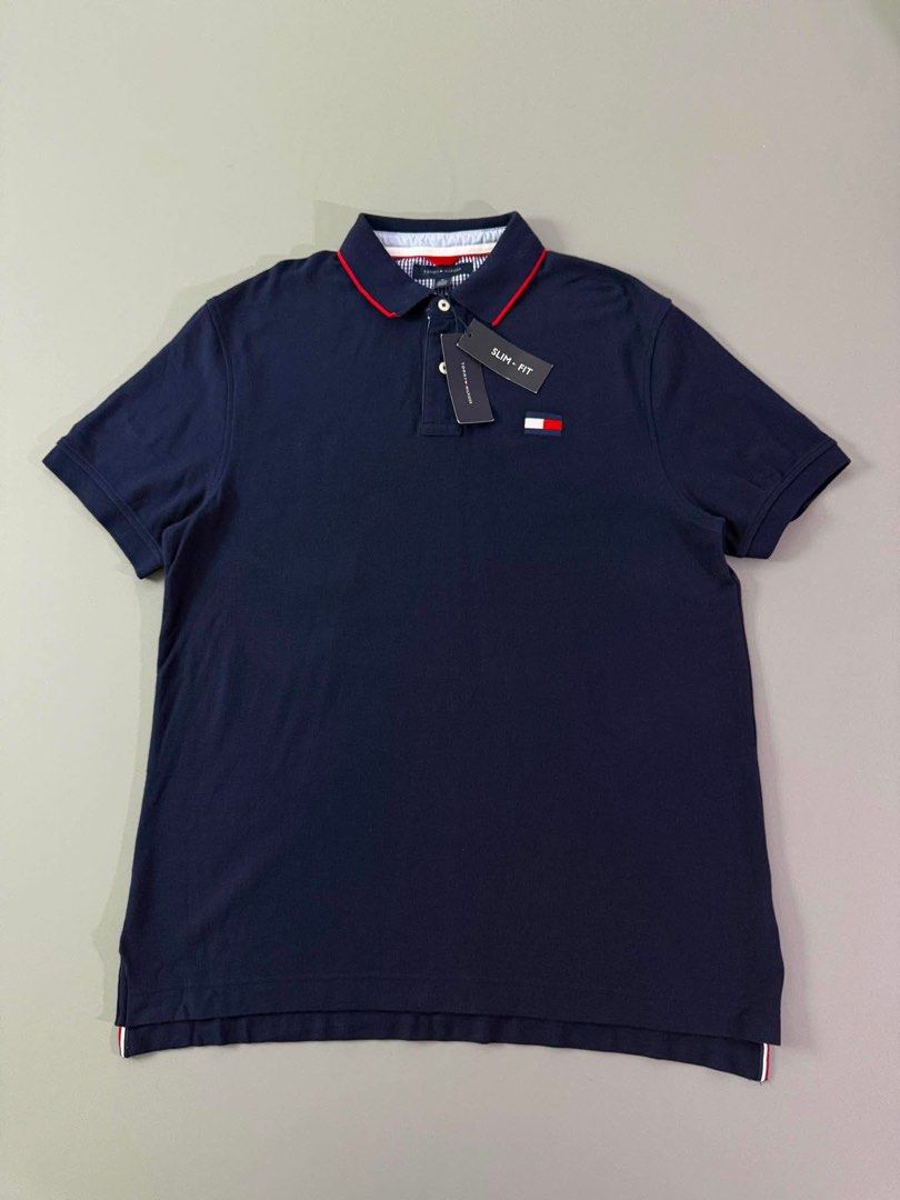TOMMY HILFIGER (Category: Tshirts & Polo Shirts ) located in Guagua. Submitted by sweetboyy (Listing ID 1461172773, Image 1). Description: TOMMY HILFIGER EXCELLENT CONDITION / NO ISSUE SIZE XLARGE ON TAG / DIMES L31 W25.