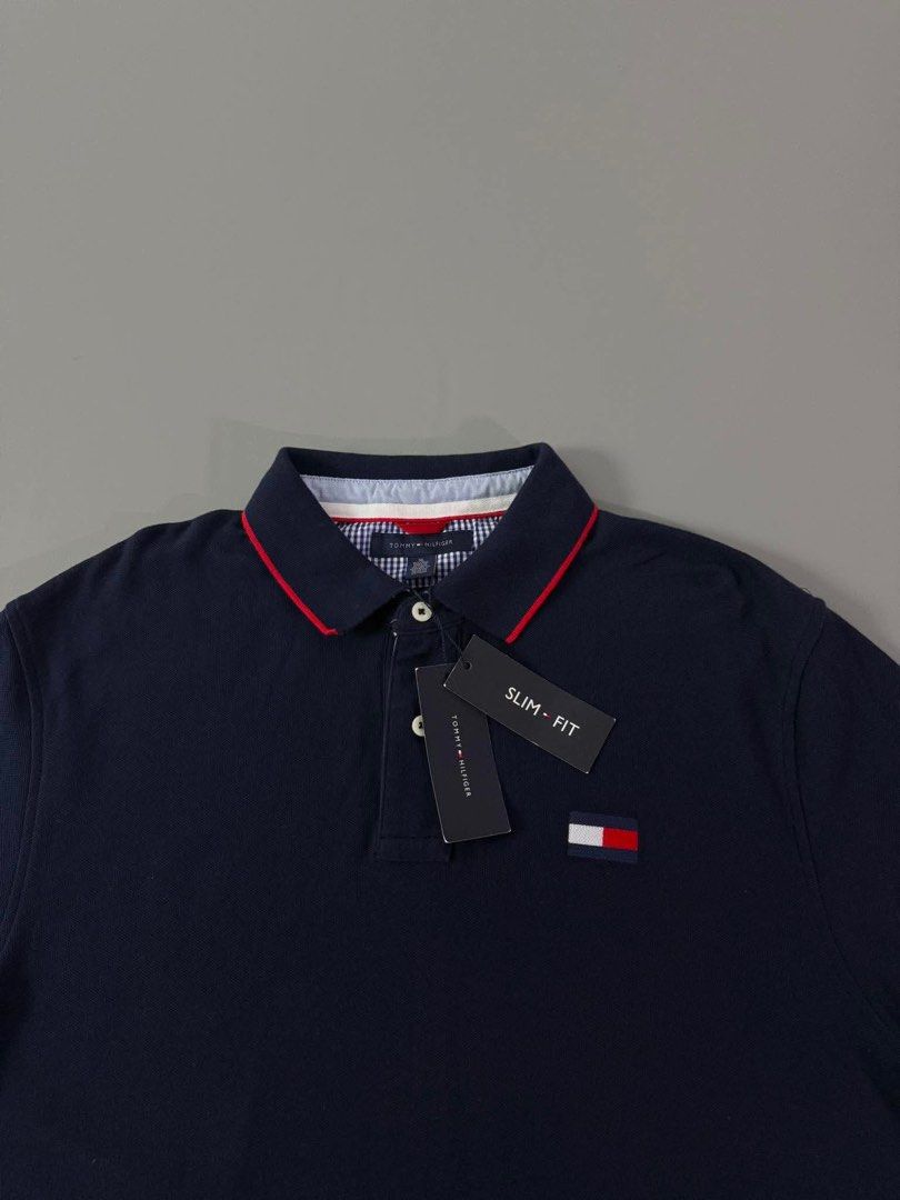 TOMMY HILFIGER (Category: Tshirts & Polo Shirts ) located in Guagua. Submitted by sweetboyy (Listing ID 1461172773, Image 2). Description: TOMMY HILFIGER EXCELLENT CONDITION / NO ISSUE SIZE XLARGE ON TAG / DIMES L31 W25.