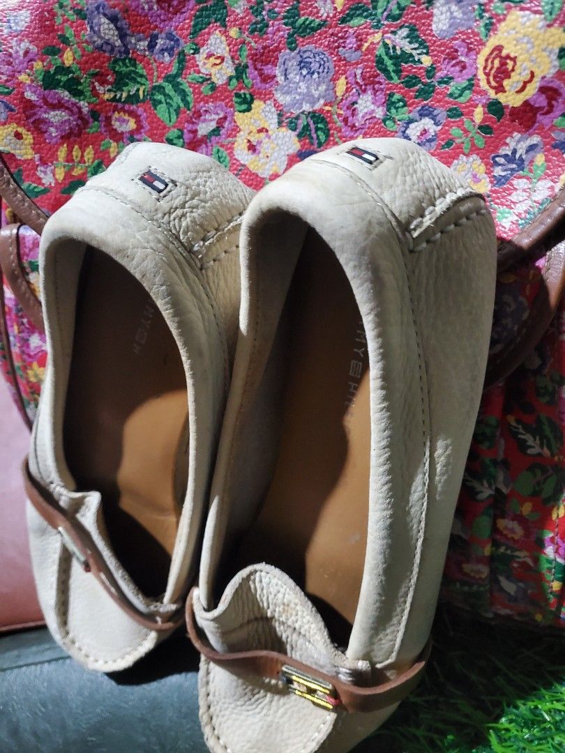 Tommy Hilfiger Beige Leather Loafers (Category: Loafers) located in Manila. Submitted by rakelherms (Listing ID 1461255426, Image 2). Description: - Brand: Tommy Hilfiger - Color: Beige leather - Style: Classic slip-on loafers - Features: Brown strap detail across the top, Tommy Hilfiger logo on insole, small logo tag on heel - Occasion: Ideal for casual or smart-casual wear.