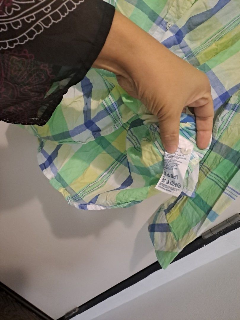 Tommy Hillfiger (Category: Longsleeves) located in Manila. Submitted by joanbalde39643 (Listing ID 1461226346, Image 3). Description: Tommy Hilfiger plaid button-down shirt featuring a green, blue, and yellow checkered pattern..