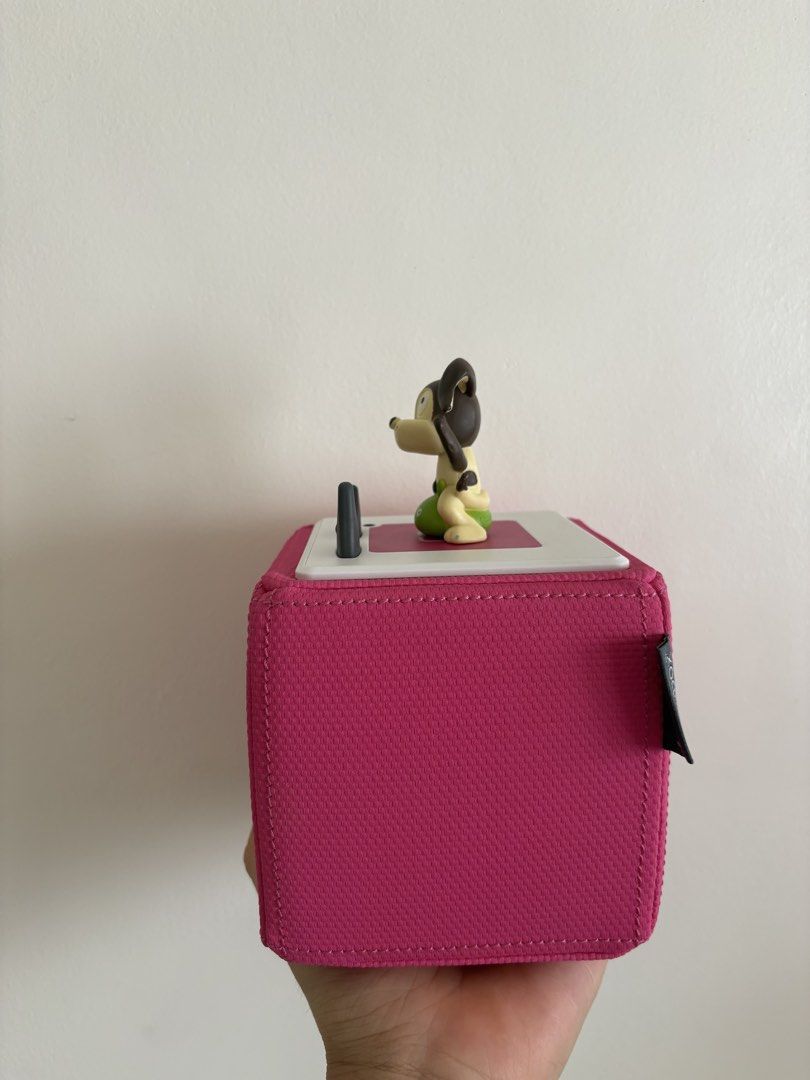 Toniebox 1 Pink Audio Player (Category: Infant Playtime) located in Muntinlupa City. Submitted by prebynik (Listing ID 1461210066, Image 2). Description: - Pink Toniebox audio player - Includes cute dog figure topper - Features a fun dot pattern speaker - Perfect for kids' stories and music - Tested and confirmed working - Ready for a new home.