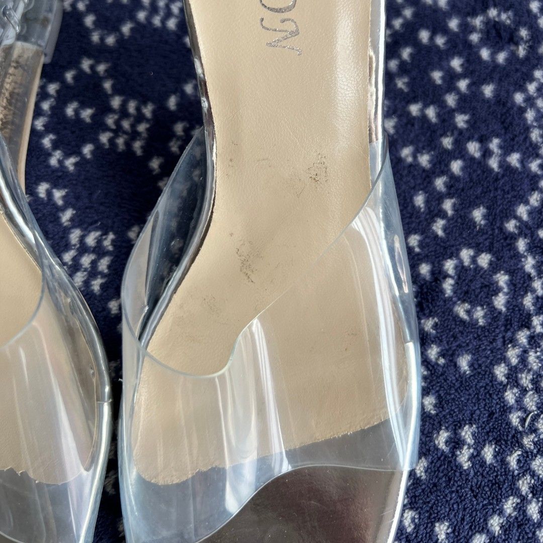 Transparent Wedge Sandals Heels (Category: Sandals) located in Quezon City. Submitted by rosepam (Listing ID 1461120770, Image 3). Description: Transparent Wedge Sandals Heels Heels 8.5cm Color silver/transparent Size 38 *may dirt sa insole (pic 3) *naka angat yung insole (pic 4) FIX PRICE New, not used with box (dirty/damaged box) seems like an old stock Bought online rfs: wrong size (not for wide feet).