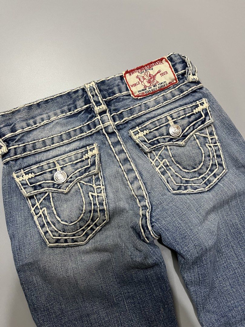 True Religion Kids Jeans Size 5 (Category: Babies & Kids Fashion) located in Manila. Submitted by jorgemabelin2001 (Listing ID 1461129302, Image 3). Description: - Kids True Religion Jeans - Classic blue denim with white stitching - Iconic horseshoe logo on back pockets - Button and zip fly closure - Features stylish distressed details on the front - Ideal for comfortable everyday wear -22x27.