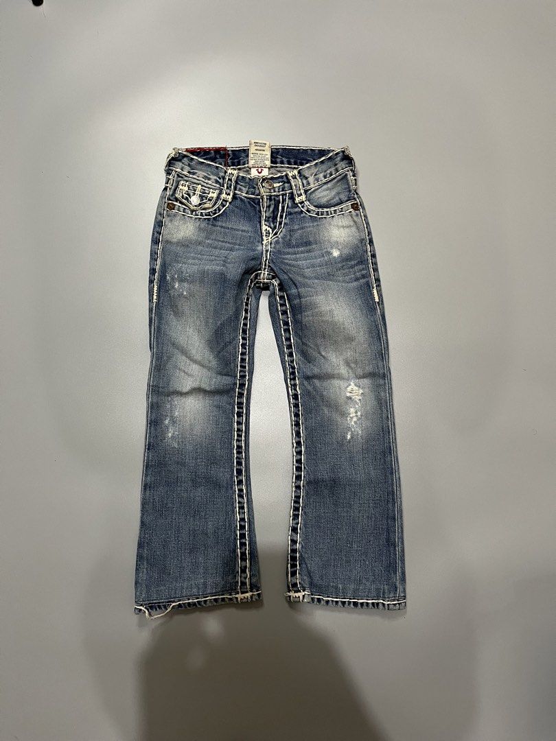 True Religion Kids Jeans Size 5 (Category: Babies & Kids Fashion) located in Manila. Submitted by jorgemabelin2001 (Listing ID 1461129302, Image 2). Description: - Kids True Religion Jeans - Classic blue denim with white stitching - Iconic horseshoe logo on back pockets - Button and zip fly closure - Features stylish distressed details on the front - Ideal for comfortable everyday wear -22x27.